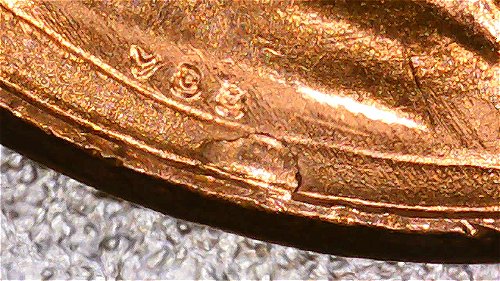 2012-LSC-Possible-Cud-On-Obverse-Below-The-Bust?